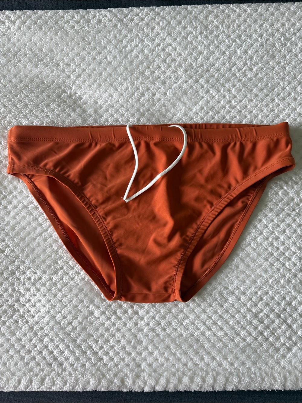 Rust Orange men’s swim brief. Sean & Val